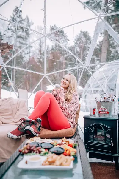 Elena relaxing inside a glass dome