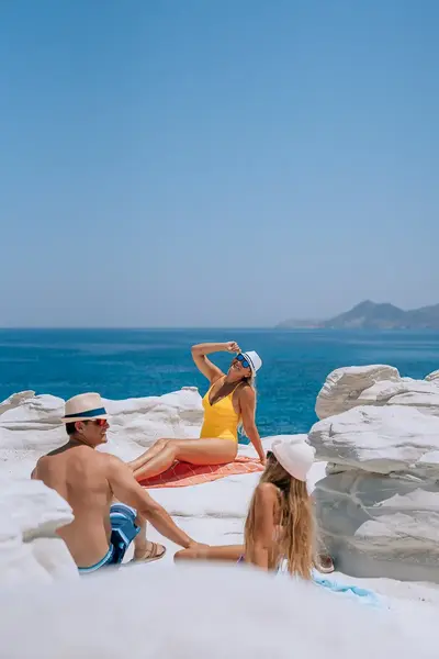 Elena with family beside the sea